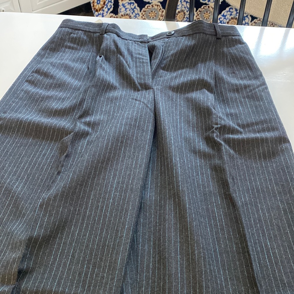 Louis Feraud Woman’s pinstriped pants.